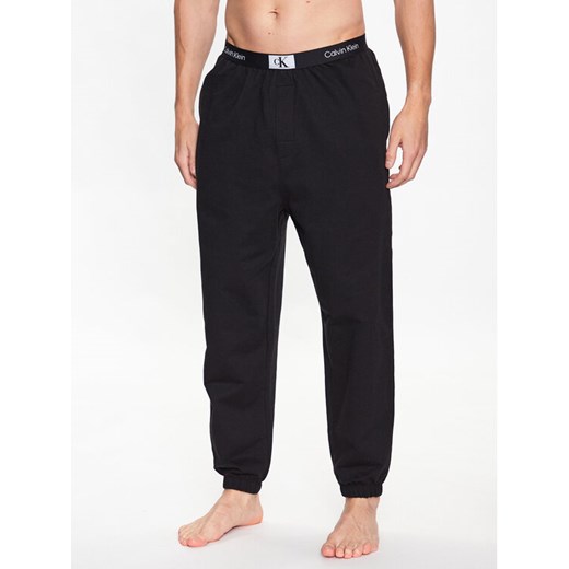 Calvin Klein Underwear Spodnie piżamowe 000NM2393E Czarny Regular Fit ze sklepu MODIVO w kategorii Piżamy męskie - zdjęcie 182714294