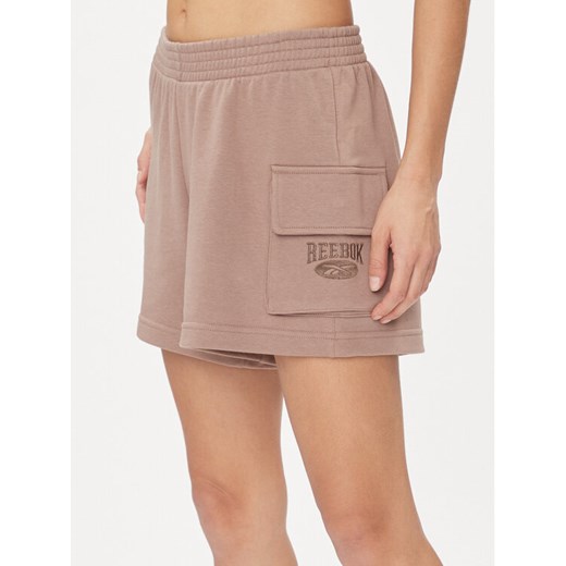 Reebok Szorty sportowe Archive Essentials IL6288 Beżowy Regular Fit ze sklepu MODIVO w kategorii Szorty - zdjęcie 182714741