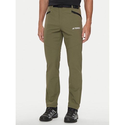 adidas Spodnie outdoor Terrex Xperior IK3533 Khaki Regular Fit ze sklepu MODIVO w kategorii Spodnie męskie - zdjęcie 182714883
