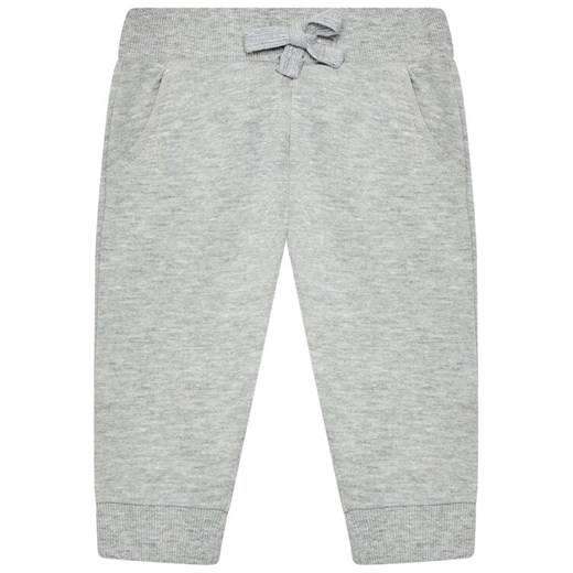 Guess Spodnie dresowe L93Q24 KAUG0 Szary Regular Fit ze sklepu MODIVO w kategorii Spodnie chłopięce - zdjęcie 182714902