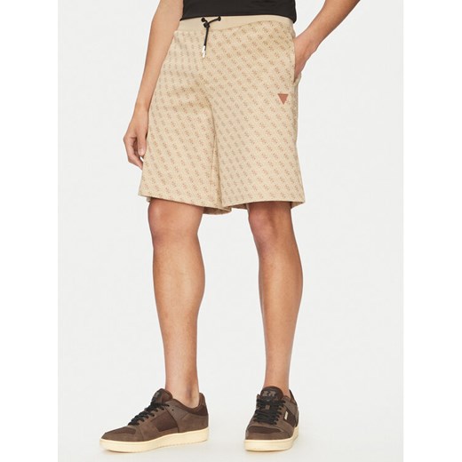 Guess Szorty sportowe Z4YD03 FL04Q Beżowy Regular Fit ze sklepu MODIVO w kategorii Spodenki męskie - zdjęcie 182715274