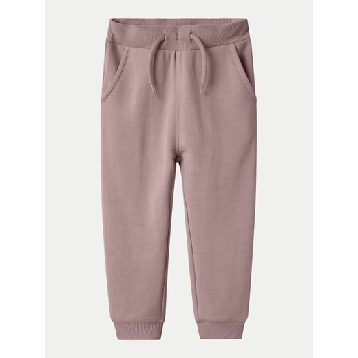 NAME IT Spodnie dresowe 13238733 Fioletowy Regular Fit ze sklepu MODIVO w kategorii Spodnie dziewczęce - zdjęcie 182716970