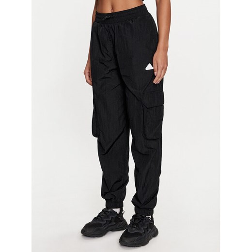 adidas Spodnie dresowe City Escape IQ4826 Czarny Loose Fit XS MODIVO