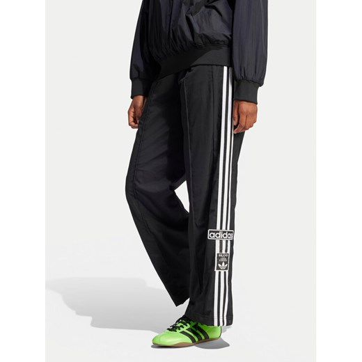 adidas Spodnie dresowe adicolor Adibreak JD0857 Czarny Loose Fit ze sklepu MODIVO w kategorii Spodnie damskie - zdjęcie 182718483