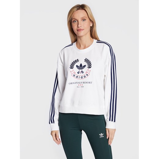 adidas Bluza Graphic HL6558 Biały Loose Fit ze sklepu MODIVO w kategorii Bluzy damskie - zdjęcie 182718642