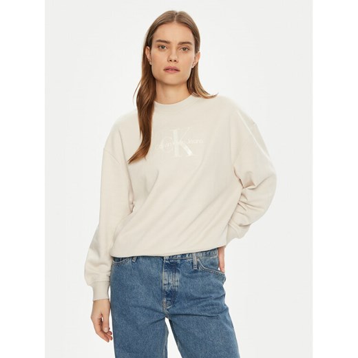 Calvin Klein Jeans Bluza Glossy Monologo J20J224724 Beżowy Regular Fit ze sklepu MODIVO w kategorii Bluzy damskie - zdjęcie 182719752