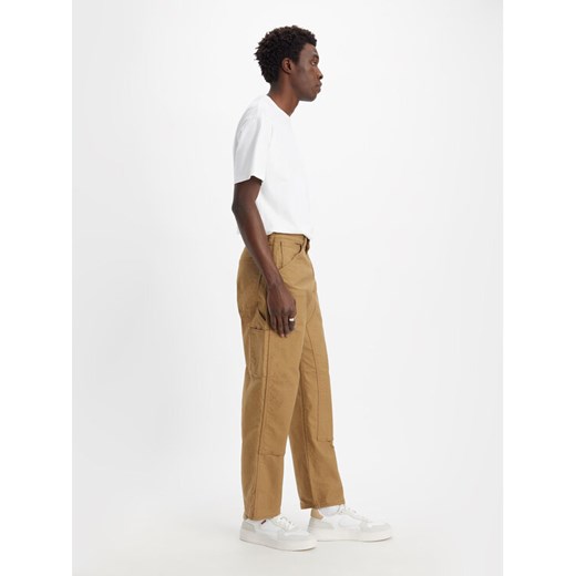 Levi's® Jeansy Workwear 565™ A5756-0001 Beżowy Relaxed Fit ze sklepu MODIVO w kategorii Jeansy męskie - zdjęcie 182720403
