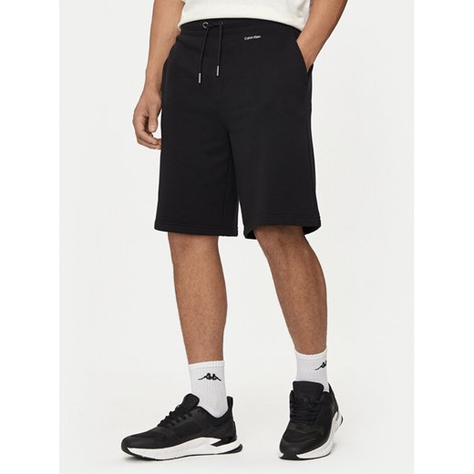 Calvin Klein Szorty sportowe Nano Logo K10K112689 Czarny Regular Fit ze sklepu MODIVO w kategorii Spodenki męskie - zdjęcie 182720733