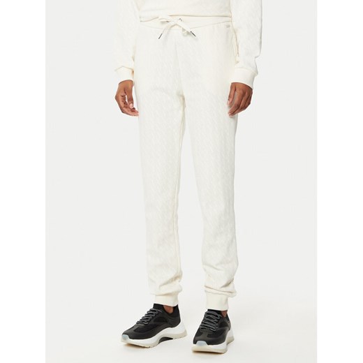 Armani Exchange Spodnie dresowe 8NYPLG YJE5Z 1130 Beżowy Regular Fit ze sklepu MODIVO w kategorii Spodnie damskie - zdjęcie 182721181