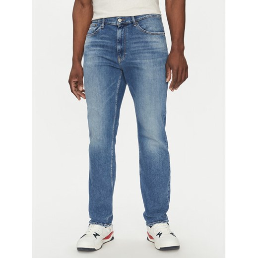 Tommy Jeans Jeansy Ryan DM0DM21011 Niebieski Slim Fit ze sklepu MODIVO w kategorii Jeansy męskie - zdjęcie 182721423