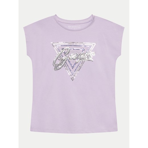 Guess T-Shirt J4GI21 K6YW4 Fioletowy Boxy Fit ze sklepu MODIVO w kategorii Bluzki dziewczęce - zdjęcie 182721473