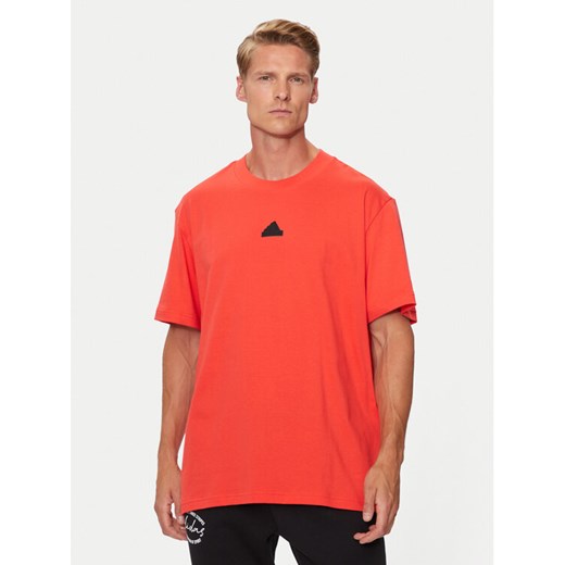 adidas T-Shirt Brand Love IW3540 Pomarańczowy Loose Fit ze sklepu MODIVO w kategorii T-shirty męskie - zdjęcie 182722002