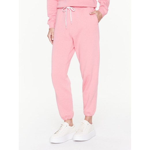 Polo Ralph Lauren Spodnie dresowe 211891560008 Różowy Regular Fit ze sklepu MODIVO w kategorii Spodnie damskie - zdjęcie 182723423