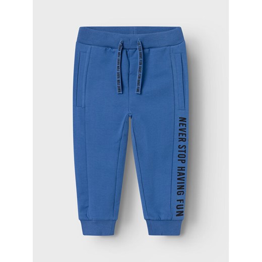 NAME IT Spodnie dresowe Benn 13226395 Niebieski Regular Fit ze sklepu MODIVO w kategorii Spodnie i półśpiochy - zdjęcie 182724964
