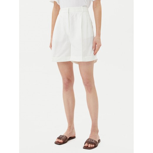Tommy Hilfiger Szorty materiałowe WW0WW47213 Écru Regular Fit ze sklepu MODIVO w kategorii Szorty - zdjęcie 182725803