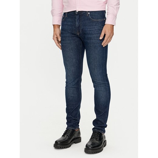 Tommy Hilfiger Jeansy Bleecker MW0MW35717 Granatowy Slim Fit ze sklepu MODIVO w kategorii Jeansy męskie - zdjęcie 182726601