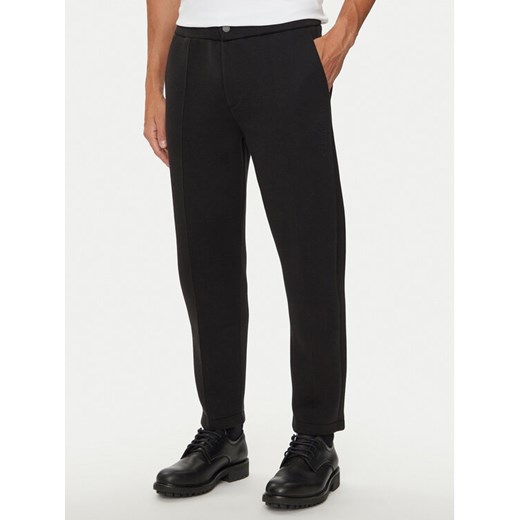 Calvin Klein Spodnie materiałowe K10K113661 Czarny Regular Fit ze sklepu MODIVO w kategorii Spodnie męskie - zdjęcie 182726884
