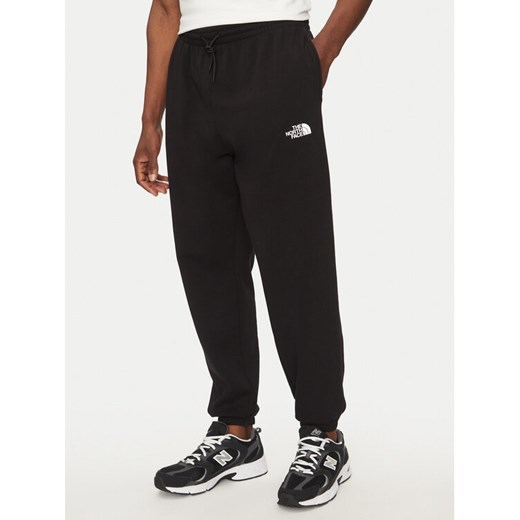 The North Face Spodnie dresowe Simple Dome Light NF0A8C41 Czarny Regular Fit ze sklepu MODIVO w kategorii Spodnie męskie - zdjęcie 182726972
