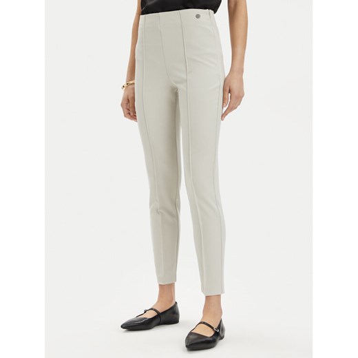 Tamaris Apparel Spodnie materiałowe Arad TAW0880 Écru Slim Fit ze sklepu MODIVO w kategorii Spodnie damskie - zdjęcie 182727140