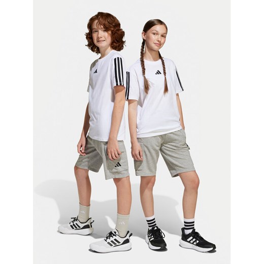 adidas Szorty sportowe Essentials Cargo JE3973 Szary Regular Fit ze sklepu MODIVO w kategorii Spodenki dziewczęce - zdjęcie 182727260