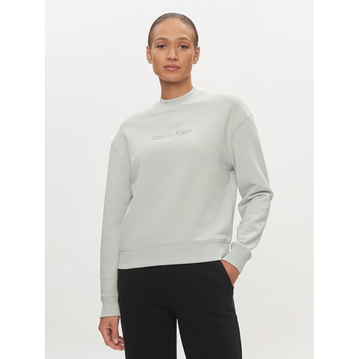 Calvin Klein Bluza Hero Logo K20K205450 Niebieski Regular Fit ze sklepu MODIVO w kategorii Bluzy damskie - zdjęcie 182728022