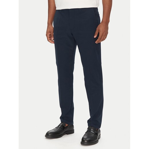 BOSS Spodnie materiałowe T_Commuter-Slim 50534303 Granatowy Slim Fit ze sklepu MODIVO w kategorii Spodnie męskie - zdjęcie 182728314