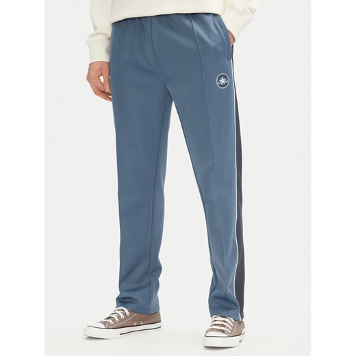 Converse Spodnie dresowe Retro Track 10027328-A01 Niebieski Regular Fit ze sklepu MODIVO w kategorii Spodnie męskie - zdjęcie 182728433