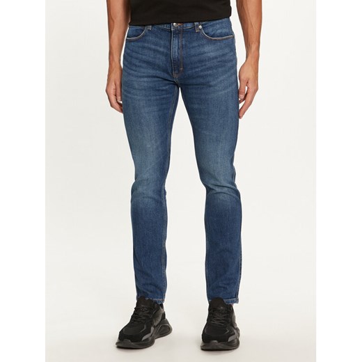 Hugo Jeansy 50522138 Niebieski Extra Slim Fit ze sklepu MODIVO w kategorii Jeansy męskie - zdjęcie 182729261