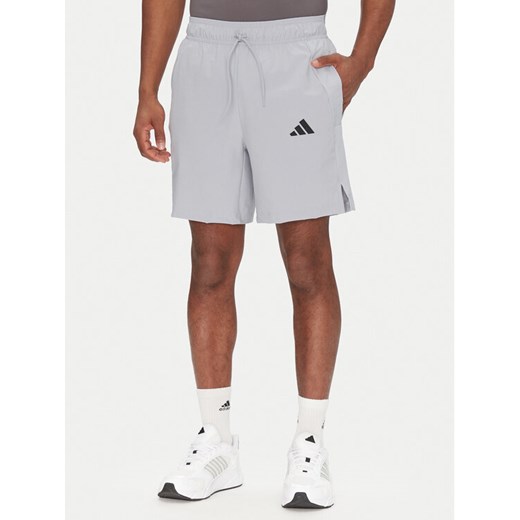 adidas Szorty sportowe Tech JM4178 Szary Regular Fit ze sklepu MODIVO w kategorii Spodenki męskie - zdjęcie 182729291