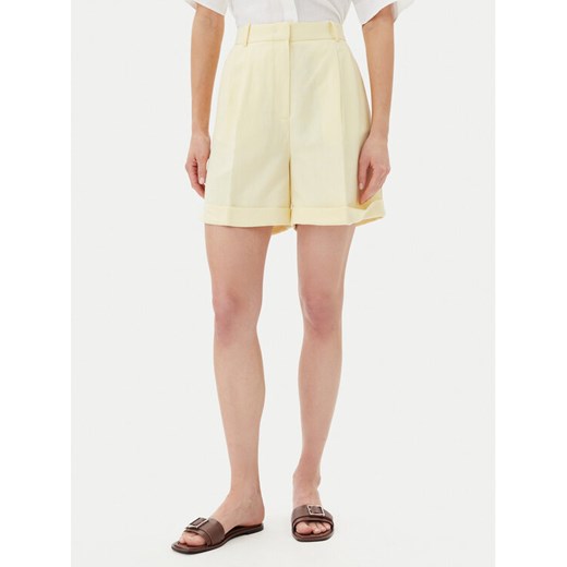 Tommy Hilfiger Szorty materiałowe WW0WW44767 Żółty Regular Fit ze sklepu MODIVO w kategorii Szorty - zdjęcie 182729402