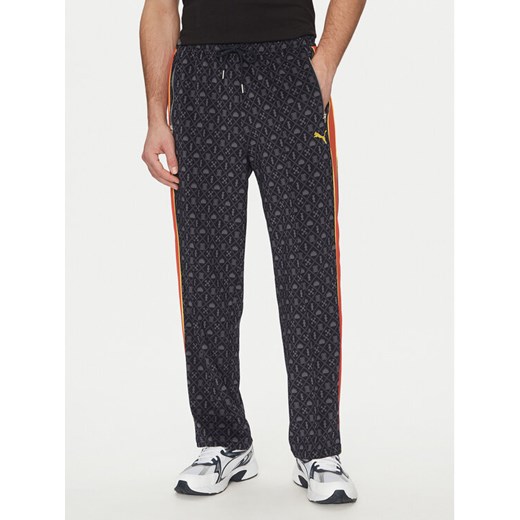 Puma Spodnie dresowe Road To Unity T7 629596 Granatowy Regular Fit ze sklepu MODIVO w kategorii Spodnie męskie - zdjęcie 182729524