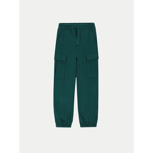 Coccodrillo Spodnie dresowe ZC4120101SGJ Zielony Regular Fit ze sklepu MODIVO w kategorii Spodnie chłopięce - zdjęcie 182729751