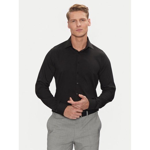 Calvin Klein Koszula Performance Solid Slim Shirt K10K114324 Czarny Regular Fit ze sklepu MODIVO w kategorii Koszule męskie - zdjęcie 182730360
