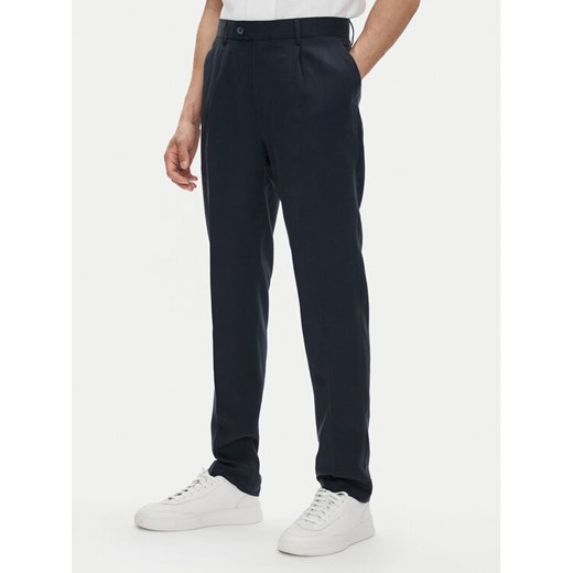Marciano Guess Spodnie materiałowe 5GHB17 2310Z Granatowy Regular Fit ze sklepu MODIVO w kategorii Spodnie męskie - zdjęcie 182731520