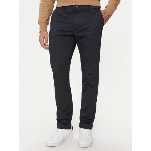 Tommy Hilfiger Chinosy MW0MW35638 Granatowy Slim Fit ze sklepu MODIVO w kategorii Spodnie męskie - zdjęcie 182732983