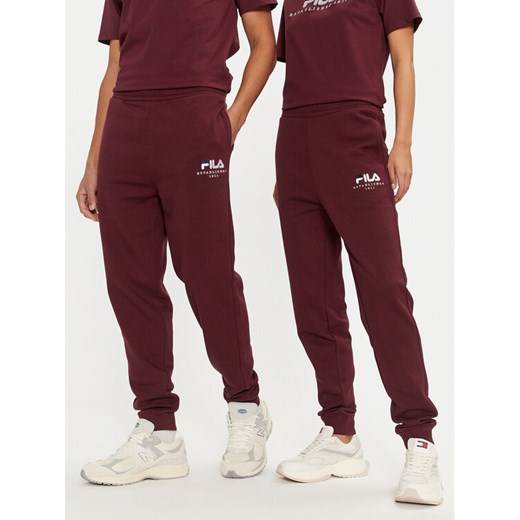 Fila Spodnie dresowe Unisex Bovrup FAU0146 Bordowy Regular Fit ze sklepu MODIVO w kategorii Spodnie męskie - zdjęcie 182733292