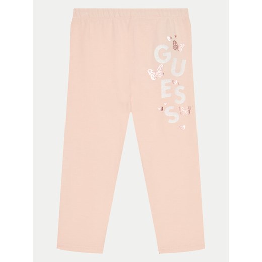 Guess Legginsy K5RB02 J1314 Koralowy Slim Fit ze sklepu MODIVO w kategorii Spodnie dziewczęce - zdjęcie 182733452