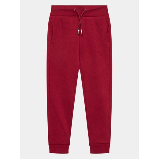 Tommy Hilfiger Spodnie dresowe Monotype KB0KB08278 D Bordowy Regular Fit ze sklepu MODIVO w kategorii Spodnie chłopięce - zdjęcie 182735664