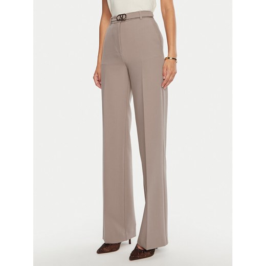 Marciano Guess Spodnie materiałowe Celia 4BGB03 7046A Beżowy Regular Fit ze sklepu MODIVO w kategorii Spodnie damskie - zdjęcie 182736664