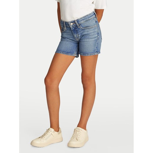 Calvin Klein Jeans Szorty jeansowe IG0IG02892 Niebieski Slim Fit ze sklepu MODIVO w kategorii Spodenki dziewczęce - zdjęcie 182736704