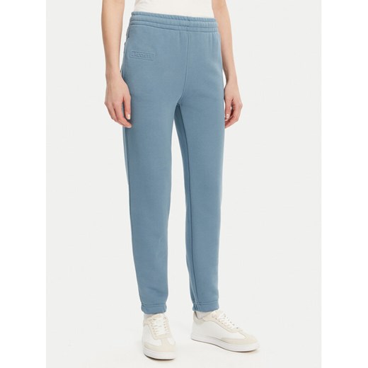 Lacoste Spodnie dresowe XF0353 Niebieski Regular Fit ze sklepu MODIVO w kategorii Spodnie damskie - zdjęcie 182737522