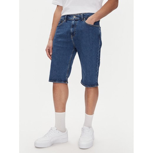 Tommy Jeans Szorty jeansowe Ryan DM0DM21851 Niebieski Slim Fit ze sklepu MODIVO w kategorii Spodenki męskie - zdjęcie 182740522