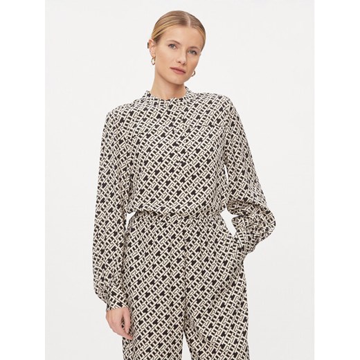 Tommy Hilfiger Bluzka WW0WW41022 Beżowy Regular Fit ze sklepu MODIVO w kategorii Bluzki damskie - zdjęcie 182740611