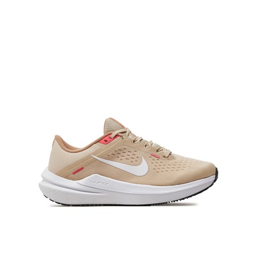 Nike Buty do biegania Air Winflo 10 DV4023 100 Beżowy ze sklepu MODIVO w kategorii Buty sportowe damskie - zdjęcie 182741564
