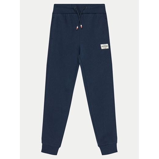 Tommy Hilfiger Spodnie dresowe KB0KB09308 Granatowy Regular Fit ze sklepu MODIVO w kategorii Spodnie chłopięce - zdjęcie 182742171