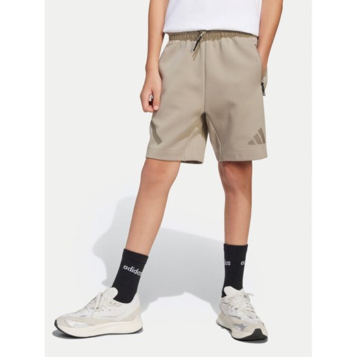 adidas Szorty sportowe Z.N.E. JD0009 Beżowy Loose Fit ze sklepu MODIVO w kategorii Spodenki chłopięce - zdjęcie 182742251