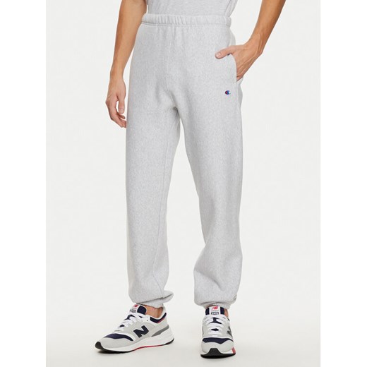 Champion Spodnie dresowe 220709 Szary Relaxed Fit ze sklepu MODIVO w kategorii Spodnie męskie - zdjęcie 182743430