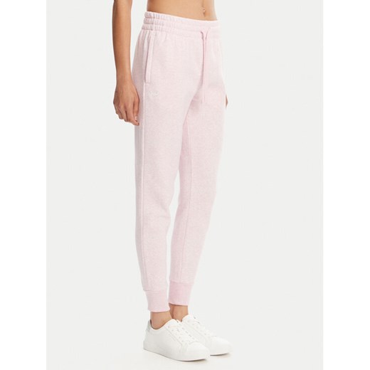Under Armour Spodnie dresowe Ua Rival Fleece Jogger 1379438 Różowy Loose Fit ze sklepu MODIVO w kategorii Spodnie damskie - zdjęcie 182743482