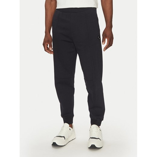 Armani Exchange Spodnie dresowe XM000472 AF13109 UB101 Granatowy Regular Fit ze sklepu MODIVO w kategorii Spodnie męskie - zdjęcie 182743483