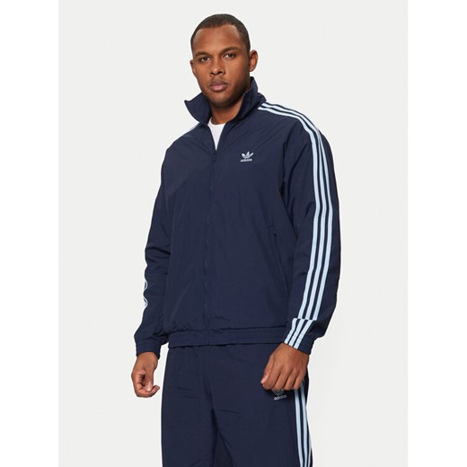 adidas Bluza adicolor Firebird JP1253 Granatowy Loose Fit ze sklepu MODIVO w kategorii Bluzy męskie - zdjęcie 182744133
